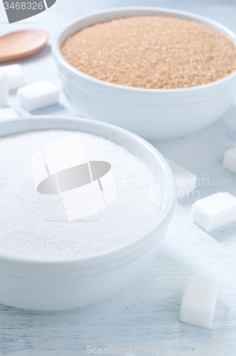 Image of Different types of sugar: brown, white and refined sugar