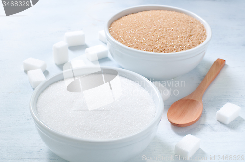 Image of Different types of sugar: brown, white and refined sugar