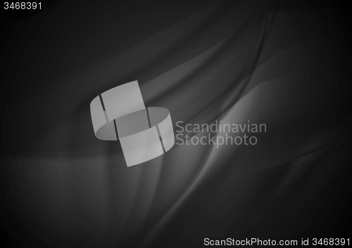 Image of Black smooth silk waves background