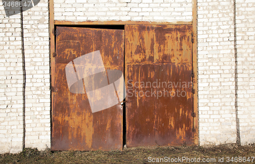 Image of old rusty gate  