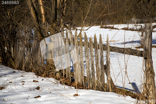 Image of wooden fence. winter  