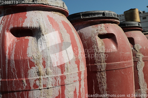 Image of Old empty plastic drums_5741