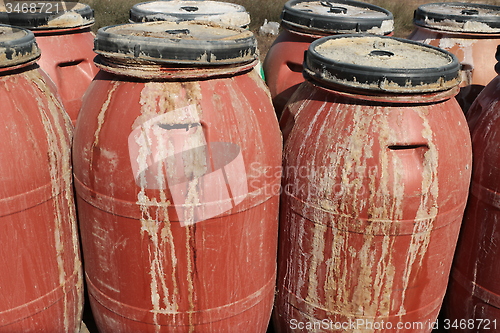 Image of Old empty plastic drums_5745