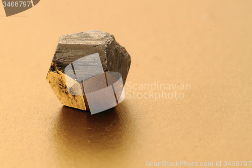 Image of pyrite gold crystal isolated