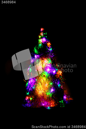 Image of christmas tree form the color xmas lights