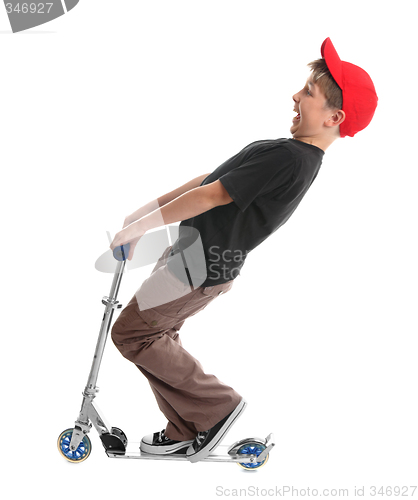 Image of Child plays on a scooter