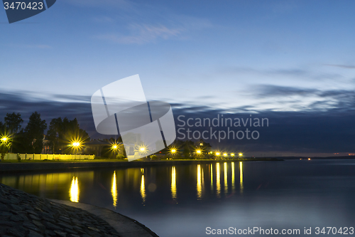 Image of Illuminated city lake quay