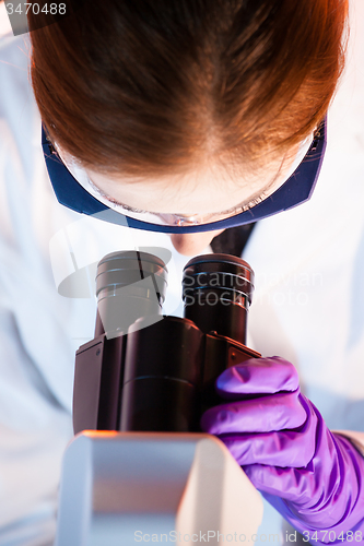 Image of Life science researcher microscoping in the laboratory.