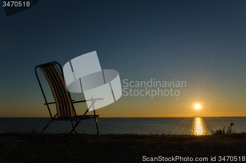 Image of Chair by the setting sun