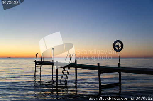 Image of Sunset by the old bath pier