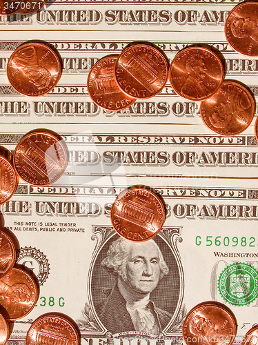 Image of Retro look Dollar coins and notes