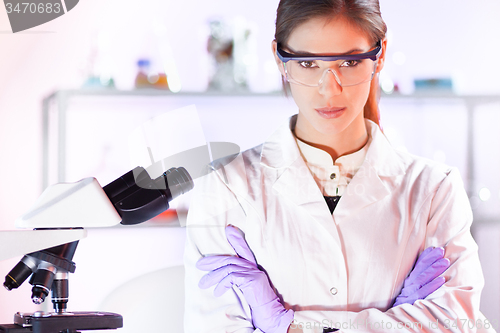 Image of Portrait of a helth care professional with microscope.