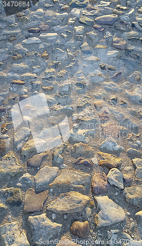 Image of Road surface paved with rough stones