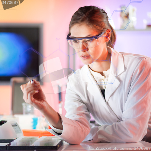 Image of Life science researcher working in laboratory.