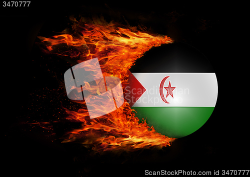 Image of Flag with a trail of fire - Western Sahara