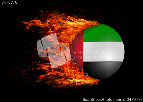 Image of Flag with a trail of fire - UAE