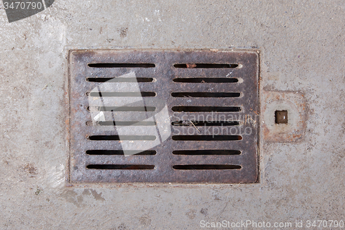 Image of Old dirty drain grate