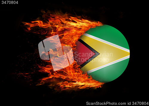 Image of Flag with a trail of fire - Guyana