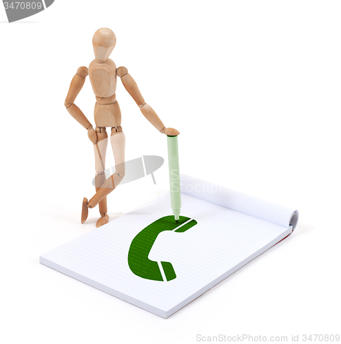 Image of Wooden mannequin writing - Telephone