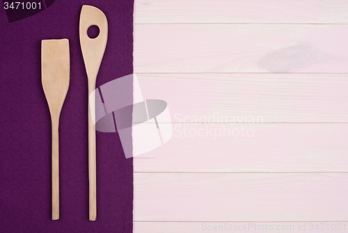 Image of Kitchenware on purple towel