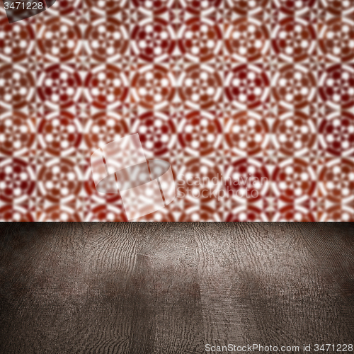 Image of Wood table top and blur vintage ceramic tile pattern wall