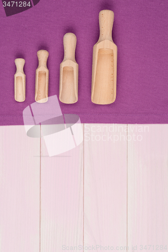Image of Kitchenware on purple towel