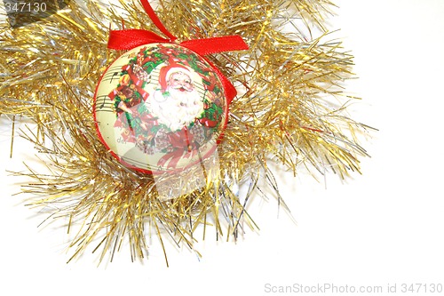 Image of papiermache bauble and tinsel