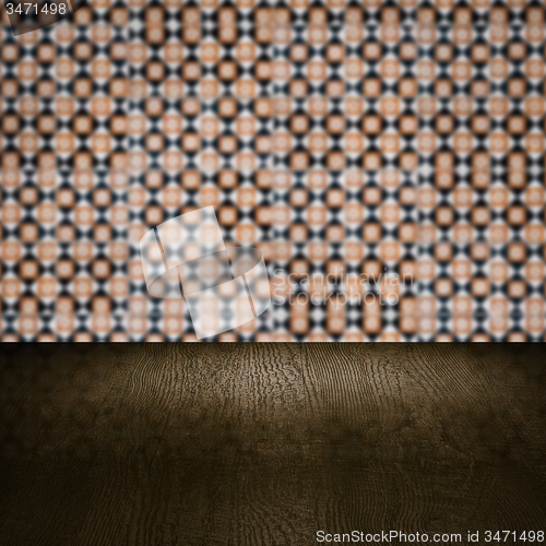 Image of Wood table top and blur vintage ceramic tile pattern wall