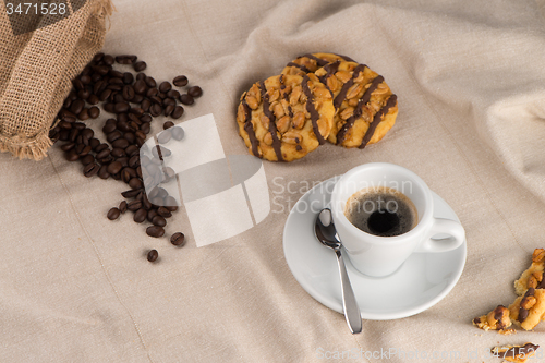Image of White coffee cup with coffee