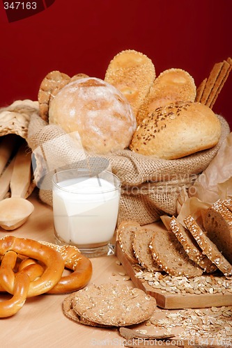 Image of Assortment of baked breads and prezells with yoghurt