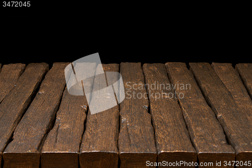 Image of Wooden top and dark space 