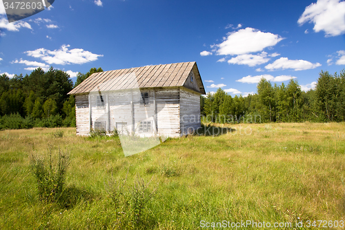 Image of the old wooden building used as Mills