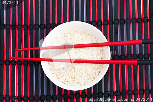 Image of chopsticks in rice