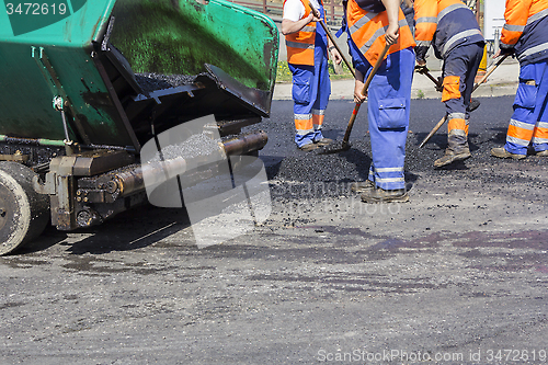 Image of Workers on Asphalting road 