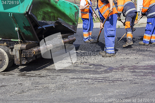 Image of Workers on Asphalting road 