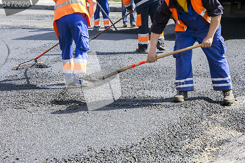 Image of Workers on Asphalting road 