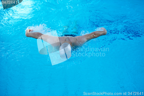 Image of swimmer excercise on indoor swimming poo