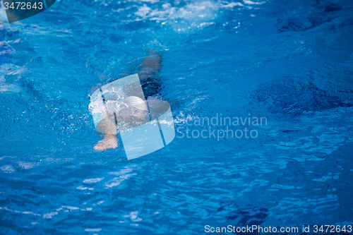 Image of swimmer excercise on indoor swimming poo