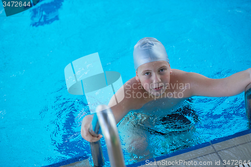 Image of child on swimming poo