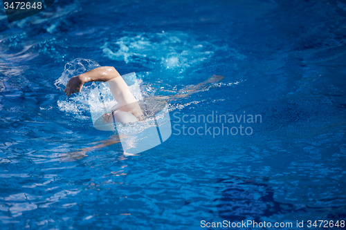 Image of swimmer excercise on indoor swimming poo