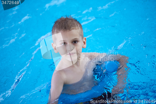 Image of child on swimming poo