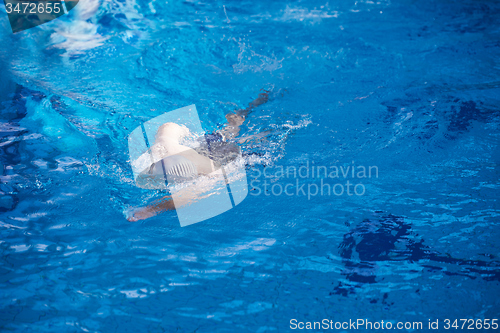 Image of swimmer excercise on indoor swimming poo