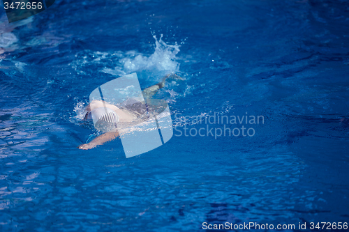 Image of swimmer excercise on indoor swimming poo