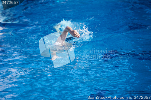 Image of swimmer excercise on indoor swimming poo