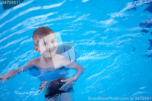 Image of child on swimming poo