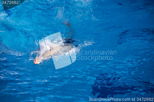 Image of swimmer excercise on indoor swimming poo