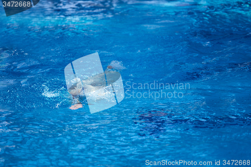 Image of swimmer excercise on indoor swimming poo