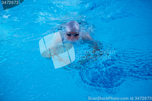 Image of swimmer excercise on indoor swimming poo