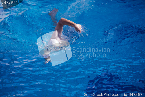 Image of swimmer excercise on indoor swimming poo