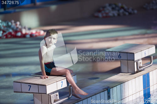 Image of child portrait on swimming pool